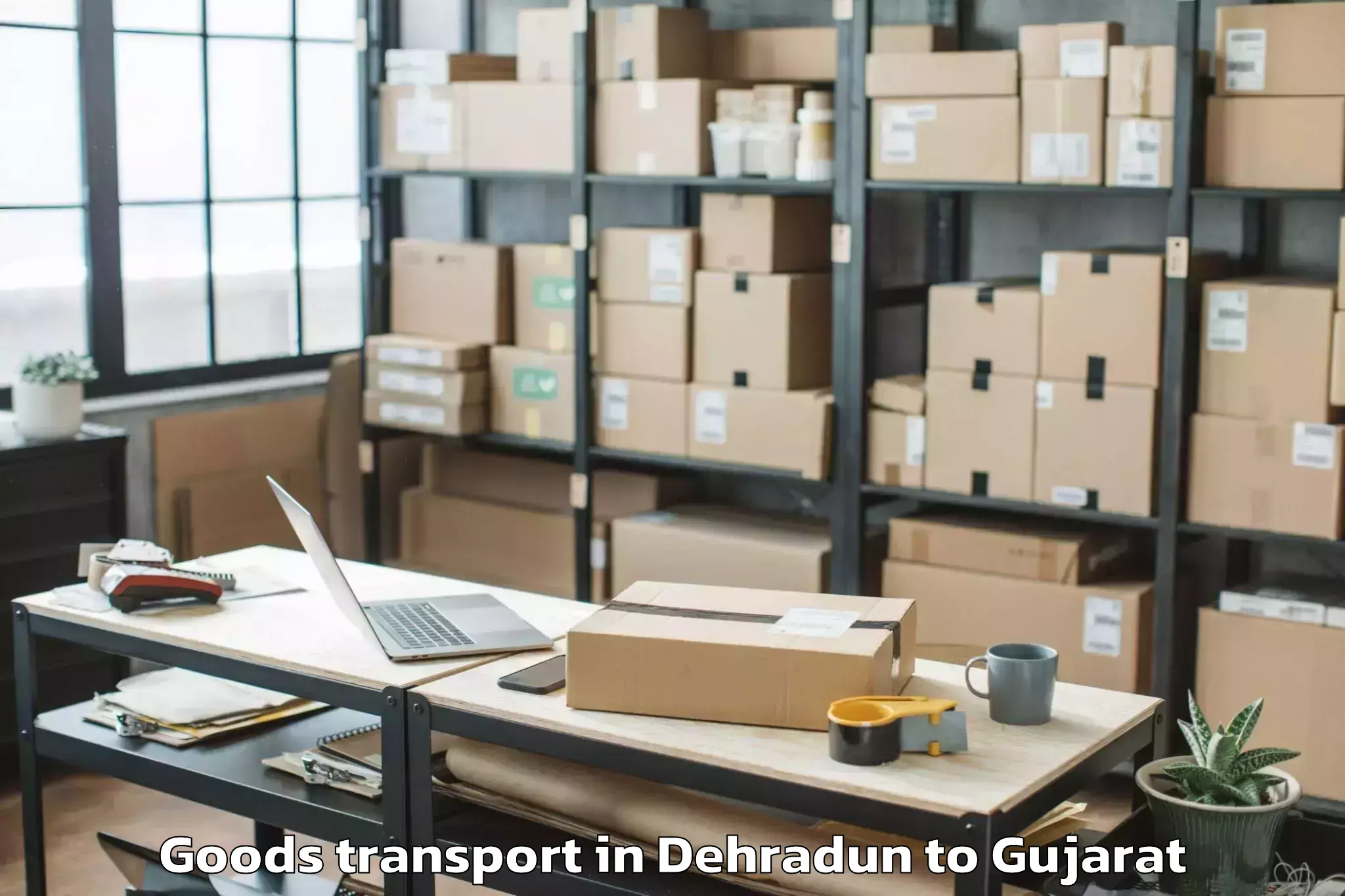 Professional Dehradun to Vaghodia Goods Transport